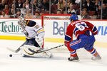 MONTREAL, CANADA - OCTOBER 18:  Ryan Miller #30 of the Buffalo Sabres stops the puck in from of Max Pacioretty #67 of the Montreal Canadiens during the NHL game at the Bell Centre on October 18, 2011 in Montreal, Quebec, Canada.  (Photo by Richard Wolowicz/Getty Images)
