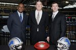 DETROIT , MI - JANUARY 16:  Jim Schwartz, center, head coach of the Detroit Lions poses with General Manager Martin Mayhew, left, and Tom Lewand team president after a press conference to introduce him as the Lions new head coach on January 16, 2009 at Ford Field in Detroit, Michigan.  (Photo by Gregory Shamus/Getty Images)