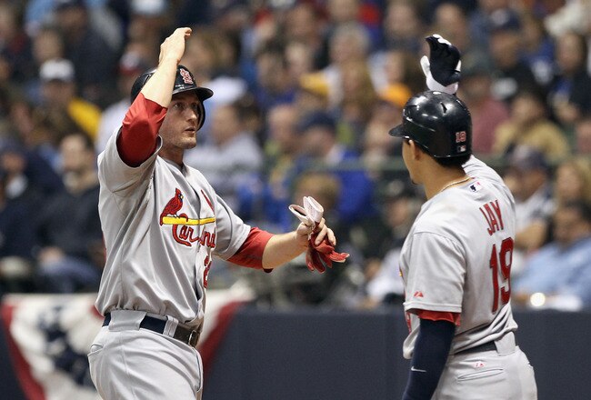 MILWAUKEE, WI - OCTOBER 16:  David Freese #23 of the St. Louis Cardinals celebrates with Jon Jay #19 after Freese scored in the top of the fifth inning against the Milwaukee Brewers during Game Six of the National League Championship Series at Miller Park on October 16, 2011 in Milwaukee, Wisconsin.  (Photo by Christian Petersen/Getty Images)