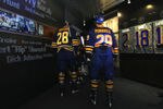 BUFFALO, NY - OCTOBER 14:  Paul Gaustad #28 and Jason Pominville #29 both of the Buffalo Sabres get set to take to the ice to face the Carolina Hurricanes during their NHL game at First Niagara Center October 14, 2011 in Buffalo, New York.  (Photo by Dave Sandford/Getty Images)