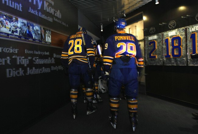 BUFFALO, NY - OCTOBER 14:  Paul Gaustad #28 and Jason Pominville #29 both of the Buffalo Sabres get set to take to the ice to face the Carolina Hurricanes during their NHL game at First Niagara Center October 14, 2011 in Buffalo, New York.  (Photo by Dave Sandford/Getty Images)