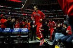 CHICAGO, IL - MAY 26:  Joakim Noah #13 of the Chicago Bulls runs out to the court from the locker room to play against the Miami Heat in Game Five of the Eastern Conference Finals during the 2011 NBA Playoffs on May 26, 2011 at the United Center in Chicago, Illinois. The Heat won 83-80. NOTE TO USER: User expressly acknowledges and agrees that, by downloading and or using this photograph, User is consenting to the terms and conditions of the Getty Images License Agreement.  (Photo by Mike Ehrmann/Getty Images)