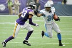 MINNEAPOLIS, MN - SEPTEMBER 25: Cedric Griffin #23 of the Minnesota Vikings looks to tackle as Jerome Harrison #36 of the Detroit Lions carries the ball in the third quarter on September 25, 2011 at Hubert H. Humphrey Metrodome in Minneapolis, Minnesota. The Lions defeated the Vikings 26-23. (Photo by Hannah Foslien/Getty Images)