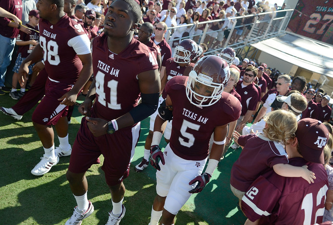COLLEGE STATION, TX - OCTOBER 15: Players of the Texas A&M Aggies run onto the field before a game against the Baylor Bears at Kyle Field on October 15, 2011 in College Station, Texas. The Texas A&M Aggies defeated the Baylor Bears 55-28. (Photo by Sarah Glenn/Getty Images)