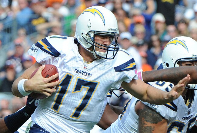 DENVER, CO - OCTOBER 9: Philip Rivers #17 of the San Diego Chargers rushes for a touchdown against the Denver Broncos at Sports Authority Field at Mile High on October 9, 2011 in Denver, Colorado. The Chargers won 29-24. (Photo by Bart Young/Getty Images)