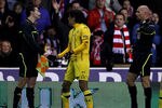 STOKE, ENGLAND - OCTOBER 20:  Yoav David Ziv of Maccabi Tel-Aviv shakes hands with the Assistant Referee after being sent off during the UEFA Europa League Group E match between Stoke City and Maccabi Tel-Aviv FC at the Britannia Stadium on October 20, 2011 in Stoke, England.  (Photo by Clive Brunskill/Getty Images)