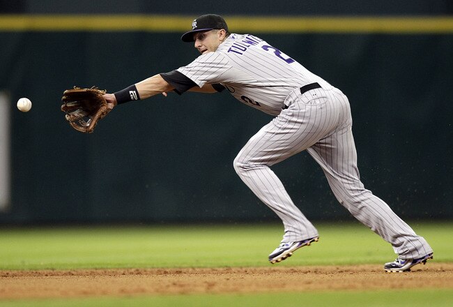 HOUSTON - SEPTEMBER 22:  Shortstop Troy Tulowitzki #2 of the Colorado Rockies can't make a play on a hard-hit ball against the Houston Astros at Minute Maid Park on September 22, 2011 in Houston, Texas.  (Photo by Bob Levey/Getty Images)