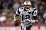 FOXBORO, MA - OCTOBER 16:  Tom Brady #12 of the New England Patriots scrambles during a game against the New England Patriots in the second half at Gillette Stadium on October 16, 2011 in Foxboro, Massachusetts. (Photo by Jim Rogash/Getty Images)