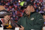ARLINGTON, TX - FEBRUARY 06:  Head coach Mike McCarthy of the Green Bay Packers holds up The Vince Lombardi Trophy after the Green Bay Packers defeated the Pittsburgh Steelers 31 to 25 in Super Bowl XLV at Cowboys Stadium on February 6, 2011 in Arlington, Texas.  (Photo by Doug Pensinger/Getty Images)