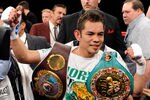 LAS VEGAS, NV - FEBRUARY 19:  Nonito Donaire of the Philippines celebrates his second-round TKO victory over Fernando Montiel of Mexico during their WBC/WBO bantamweight championship bout at the Mandalay Bay Events Center February 19, 2011 in Las Vegas, Nevada.  (Photo by Ethan Miller/Getty Images)