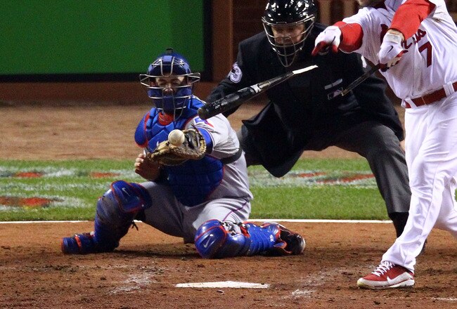 ST LOUIS, MO - OCTOBER 20:  Matt Holliday #7 of the St. Louis Cardinals breaks his bat while grounding into a double play in the fourth inning during Game Two of the MLB World Series against the Texas Rangers at Busch Stadium on October 20, 2011 in St Louis, Missouri.  (Photo by Dilip Vishwanat/Getty Images)