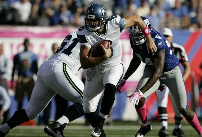 EAST RUTHERFORD, NJ - OCTOBER 9: Quarterback Charlie Whitehurst #6 of the Seattle Seahawks looks to run during a game against the New York Giants at MetLife Stadium on October 9, 2011 in East Rutherford, New Jersey. The Seahawks defeated the Giants 36-25. (Photo by Rich Schultz /Getty Images)