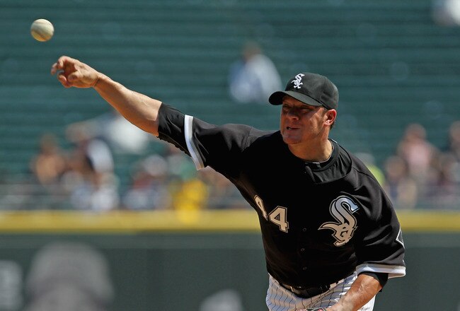 CHICAGO, IL - AUGUST 31: Starting pitcher Jake Peavy #44 of the Chicago White Sox delivers the ball against the Minnesota Twins at U.S. Cellular Field on August 31, 2011 in Chicago, Illinois. (Photo by Jonathan Daniel/Getty Images)