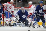 TORONTO, CANADA - OCTOBER 6:  James Reimer #34 of the Toronto Maple Leafs watches an incoming shot in a game against the Montreal Canadiens on October 6, 2011 at the Air Canada Centre in Toronto, Canada. The Leafs defeated the Canadiens 2-0. (Photo by Claus Andersen/Getty Images)