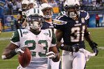SAN DIEGO - JANUARY 17:  Running back Shonn Greene #23 of the New York Jets scores a touchdown in the fourth quarter in front of cornerback Antonio Cromartie #31 of the San Diego Chargers in the AFC Divisional Playoff Game at Qualcomm Stadium on January 17, 2010 in San Diego, California.  (Photo by Stephen Dunn/Getty Images)