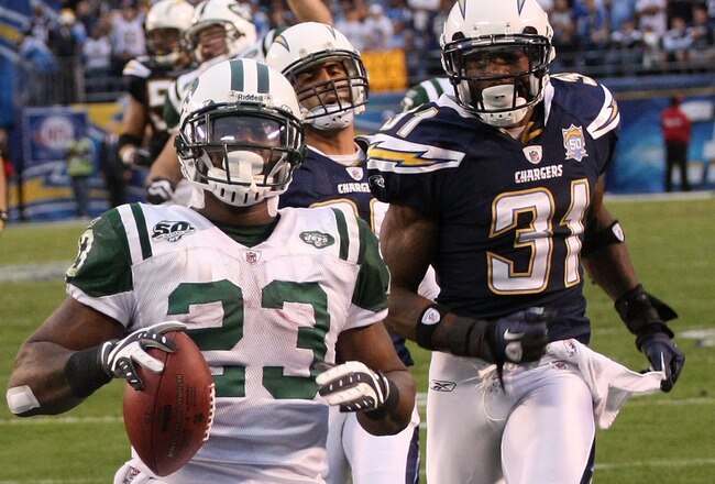 SAN DIEGO - JANUARY 17:  Running back Shonn Greene #23 of the New York Jets scores a touchdown in the fourth quarter in front of cornerback Antonio Cromartie #31 of the San Diego Chargers in the AFC Divisional Playoff Game at Qualcomm Stadium on January 17, 2010 in San Diego, California.  (Photo by Stephen Dunn/Getty Images)