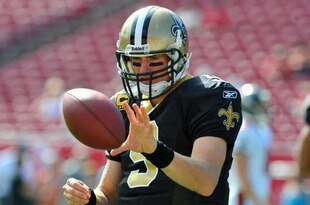 TAMPA, FL - OCTOBER 16:  Quarterback Drew Brees #9 of the New Orleans Saints warms up for play against the Tampa Bay Buccaneers October 16, 2011 at Raymond James Stadium in Tampa, Florida. (Photo by Al Messerschmidt/Getty Images)
