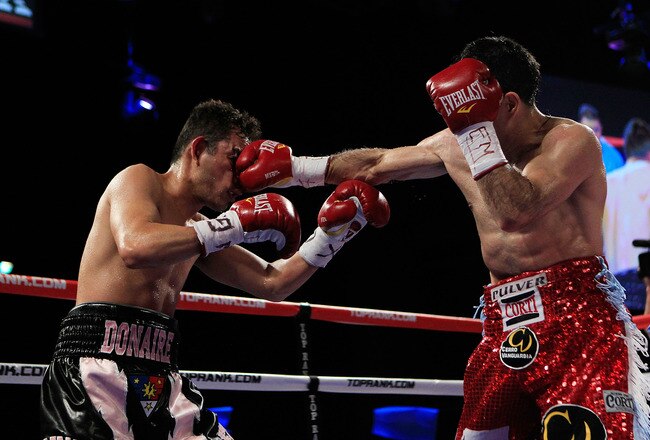 NEW YORK - OCTOBER 22:  (R-L) Omar Narvaez of Argentina connects with a right to Nonito Donaire of the Philippines in the WBC, WBO World Bantamweight Titles bout at Madison Square Garden on October 22, 2011 in New York City.  (Photo by Chris Trotman/Getty Images)