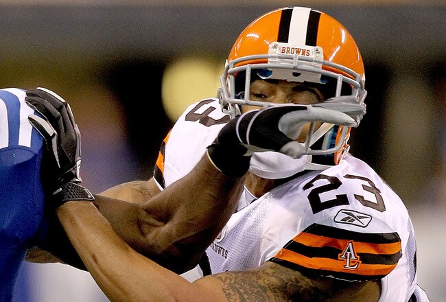 INDIANAPOLIS, IN - SEPTEMBER 18:  Joseph Addai #29 of the Indianapolis Colts carries the ball against Joe Haden #23 of the Cleveland Browns at Lucas Oil Stadium on September 18, 2011 in Indianapolis, Indiana.  (Photo by Matthew Stockman/Getty Images)