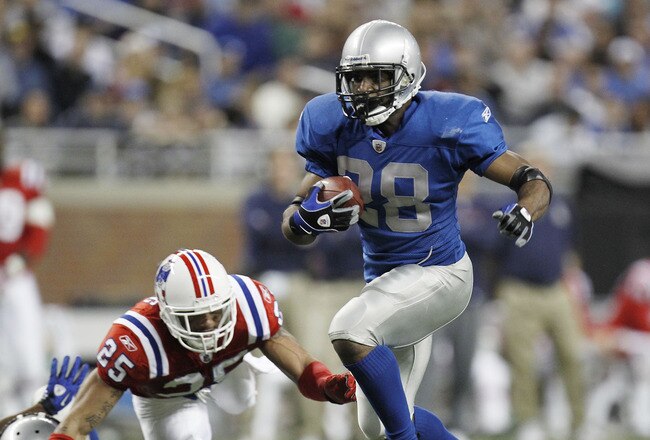 DETROIT - NOVEMBER 25:  Maurice Morris #28 of the Detroit Lions tries to get around the tackle of Patrick Chung #25 the New England Patriots on November 25, 2010 at Ford Field in Detroit, Michigan.  (Photo by Gregory Shamus/Getty Images)