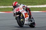 KUALA LUMPUR, MALAYSIA - OCTOBER 22:  Marco Simoncelli of Italy and San Carlo Honda Gresini lifts the front wheel during the qualifying practice of MotoGP of Malaysia at Sepang Circuit on October 22, 2011 in Kuala Lumpur, Malaysia.  (Photo by Mirco Lazzari gp/Getty Images)