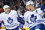 MONTREAL, CANADA - OCTOBER 22:  Mikhail Grabovski #84 of the Toronto Maple Leafs celebrates after scoring the game winning goal in overtime during the NHL game against the Montreal Canadiens at the Bell Centre on October 22, 2011 in Montreal, Quebec, Canada.  The Maple Leafs defeated the Canadiens 5-4 in overtime.  (Photo by Richard Wolowicz/Getty Images)