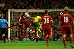 LIVERPOOL, ENGLAND - OCTOBER 22:  Grant Holt of Norwich City scores his team's first goal during the Barclays Premier League match between Liverpool and Norwich City at Anfield on October 22, 2011 in Liverpool, England.  (Photo by Richard Heathcote/Getty Images)
