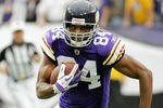 MINNEAPOLIS, MN - SEPTEMBER 25: Michael Jenkins #84 of the Minnesota Vikings carries the ball against the Detroit Lions on September 25, 2011 at Hubert H. Humphrey Metrodome in Minneapolis, Minnesota. (Photo by Hannah Foslien/Getty Images)