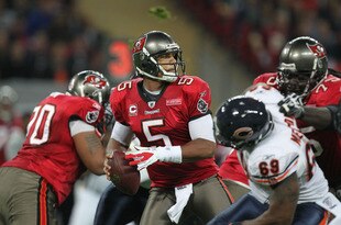 LONDON, ENGLAND - OCTOBER 23:  Josh Freeman #5 of the Tampa Bay Buccaneers looks for a pass during the NFL International Series match between Chicago Bears and Tampa Bay Buccaneers at Wembley Stadium on October 23, 2011 in London, England. This is the fifth occasion where a regular season NFL match has been played in London.  (Photo by Streeter Lecka/Getty Images)