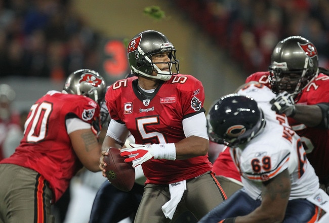 LONDON, ENGLAND - OCTOBER 23:  Josh Freeman #5 of the Tampa Bay Buccaneers looks for a pass during the NFL International Series match between Chicago Bears and Tampa Bay Buccaneers at Wembley Stadium on October 23, 2011 in London, England. This is the fifth occasion where a regular season NFL match has been played in London.  (Photo by Streeter Lecka/Getty Images)