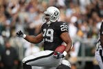 OAKLAND, CA - SEPTEMBER 25:  Michael Bush #29 of the Oakland Raiders celebrates after scoring a touchdown against the New York Jets at O.co Coliseum on September 25, 2011 in Oakland, California.  (Photo by Jed Jacobsohn/Getty Images)