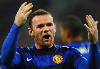 BUCHAREST, ROMANIA - OCTOBER 18:  Wayne Rooney of Manchester United celebrates scoring from the penalty spot during the UEFA Champions League Group C match between FC Otelul Galati and Manchester United at the National Stadium on October 18, 2011 in Bucharest, Romania.   (Photo by Laurence Griffiths/Getty Images)