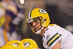 MINNEAPOLIS, MN - OCTOBER 23:  Aaron Rodgers #12 of the Green Bay Packers looks down the line against the Minnesota Vikngs at the Hubert H. Humphrey Metrodome on October 23, 2011 in Minneapolis, Minnesota.  (Photo by Adam Bettcher /Getty Images)