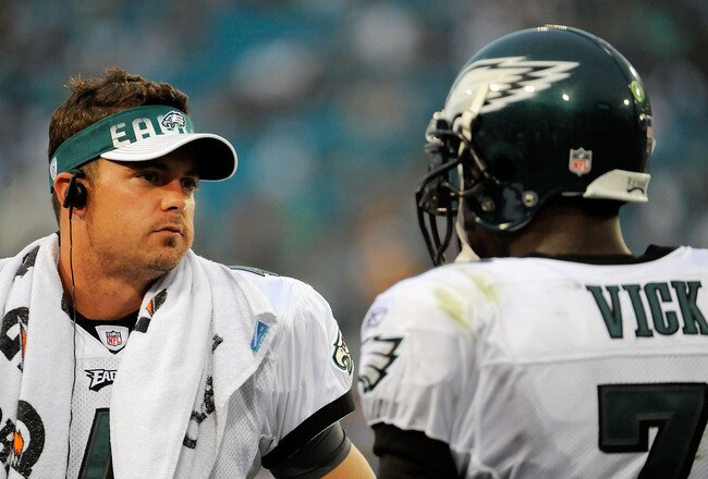 JACKSONVILLE, FL - SEPTEMBER 26:  Quarterbacks Kevin Kolb #4 and Michael Vick #7 of the Philadelphia Eagles talk on the sidelines during a time-out against the Jacksonville Jaguars at EverBank Field on September 26, 2010 in Jacksonville, Florida. The Eagles defeated the Jaguars 28-3.  (Photo by Doug Benc/Getty Images)