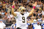 NEW ORLEANS, LA - OCTOBER 23:  Drew Brees #9 of the New Orleans Saints reacts to a touchdown during a game against the Indianapolis Colts being held at Mercedes-Benz Superdome on October 23, 2011 in New Orleans, Louisiana.  (Photo by Stacy Revere/Getty Images)