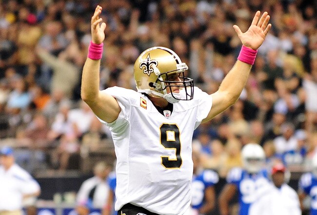 NEW ORLEANS, LA - OCTOBER 23:  Drew Brees #9 of the New Orleans Saints reacts to a touchdown during a game against the Indianapolis Colts being held at Mercedes-Benz Superdome on October 23, 2011 in New Orleans, Louisiana.  (Photo by Stacy Revere/Getty Images)