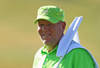 VILAMOURA, PORTUGAL - OCTOBER 12:  John Daly of the USA holds the flag on the 18th green during the pro-am for the Portugal Masters at Oceanico Victoria Golf Course on October 12, 2011 in Vilamoura, Portugal.  (Photo by Richard Heathcote/Getty Images)