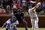 ARLINGTON, TX - OCTOBER 22:  Albert Pujols #5 of the St. Louis Cardinals hits a solo home run in the ninth inning for his third home run of the night during Game Three of the MLB World Series against pitcher Darren Oliver of the Texas Rangers at Rangers Ballpark in Arlington on October 22, 2011 in Arlington, Texas.  (Photo by Rob Carr/Getty Images)