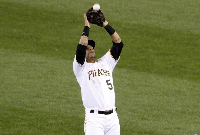 PITTSBURGH, PA - SEPTEMBER 24:  Ronny Cedeno #5 of the Pittsburgh Pirates plays the field against the Cincinnati Reds during the game on September 24, 2011 at PNC Park in Pittsburgh, Pennsylvania.  (Photo by Justin K. Aller/Getty Images)