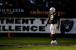 OAKLAND, CA - JANUARY 03:  JaMarcus Russell #2 of the Oakland Raiders looks on against the Baltimore Ravens during an NFL game at Oakland-Alameda County Coliseum on January 3, 2010 in Oakland, California.  (Photo by Jed Jacobsohn/Getty Images)