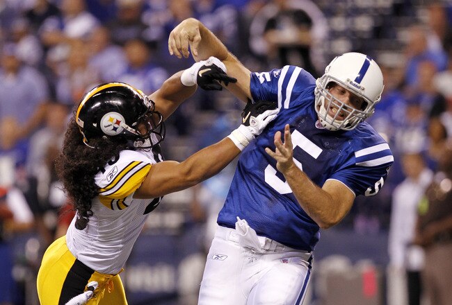 INDIANAPOLIS, IN - SEPTEMBER 25: Troy Polamalu #43 of the Pittsburgh Steelers hits Kerry Collins #5 of the Indianapolis Colts in the first half at Lucas Oil Stadium on September 25, 2011 in Indianapolis, Indiana. (Photo by Joe Robbins/Getty Images)