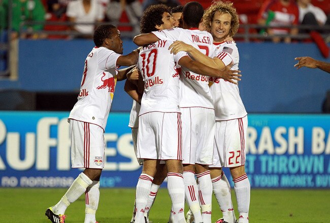 FRISCO, TX - OCTOBER 26: The New York Red Bulls celebrate a goal by Joel Lindpere #20 against FC Dallas during a wild card match at Pizza Hut Park on October 26, 2011 in Frisco, Texas.  (Photo by Ronald Martinez/Getty Images)