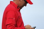 TURNBERRY, SCOTLAND - JULY 14:  Ian Poulter of England sends a message with his mobile phone during a practice round prior to the 138th Open Championship on July 14, 2009 on the Ailsa Course, Turnberry Golf Club, Turnberry, Scotland.  (Photo by Andrew Redington/Getty Images)