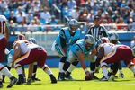 CHARLOTTE, NC - OCTOBER 23: Cam Newton #1 of the Carolina Panthers lines up against the Washington Redskins at the Bank of America Stadium on October 23, 2011 in Charlotte, North Carolina.  (Photo by Dilip Vishwanat/Getty Images)