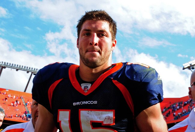 MIAMI GARDENS, FL - OCTOBER 23: Tim Tebow #15 of the Denver Broncos heads off the field after the game against the Miami Dolphins at Sun Life Stadium on October 23, 2011 in Miami Gardens, Florida. (Photo by Scott Cunningham/Getty Images)