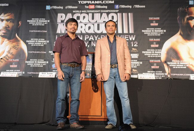 NEW YORK, NY - SEPTEMBER 06:  Professional Boxers Manny Pacquiao (L) and Juan Manuel Marquez attend the press conference for their World Welterweight Championship Fight at The Lighthouse at Chelsea Piers on September 6, 2011 in New York City.  (Photo by Michael Loccisano/Getty Images)