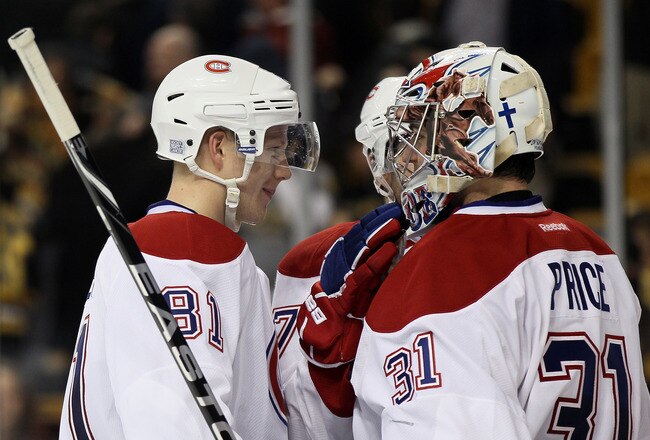 BOSTON, MA - OCTOBER 27:  Carey Price #31 of the Montreal Canadiens is congratulated by treammates Lars Eller #81 after the win over the Boston Bruins on October 27, 2011 at TD Garden in Boston, Massachusetts. The Montreal Canadiens defeated the Boston Bruins 2-1.  (Photo by Elsa/Getty Images)
