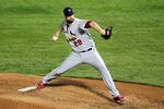 ARLINGTON, TX - OCTOBER 24: Chris Carpenter #29 of the St. Louis Cardinals pitches in the fifth inning during Game Five of the MLB World Series against the Texas Rangers at Rangers Ballpark in Arlington on October 24, 2011 in Arlington, Texas.  (Photo by Ezra Shaw/Getty Images)