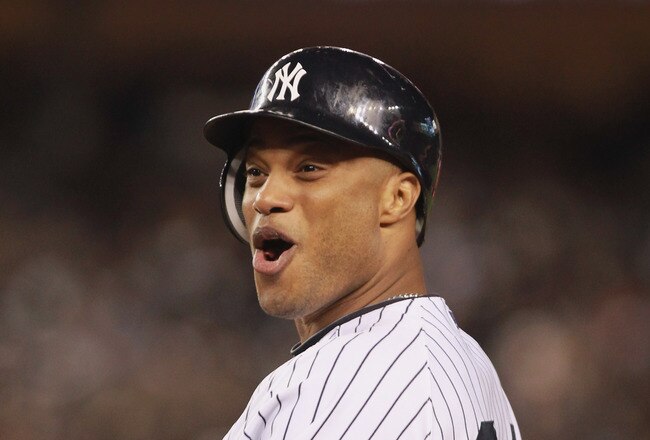 NEW YORK, NY - OCTOBER 06:  Robinson Cano #24 of the New York Yankees reacts after he hit an infield single in the bottom of the seventh inning against the Detroit Tigers during Game Five of the American League Championship Series at Yankee Stadium on October 6, 2011 in the Bronx borough of New York City.  (Photo by Nick Laham/Getty Images)