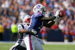 ORCHARD PARK, NY - SEPTEMBER 25:  Steve Johnson #13 of the Buffalo Bills makes a catch against  Leigh Bodden #23 of the New England Patriots at Ralph Wilson Stadium on September 25, 2011 in Orchard Park, New York. Buffalo won 34-31.  (Photo by Rick Stewart/Getty Images)